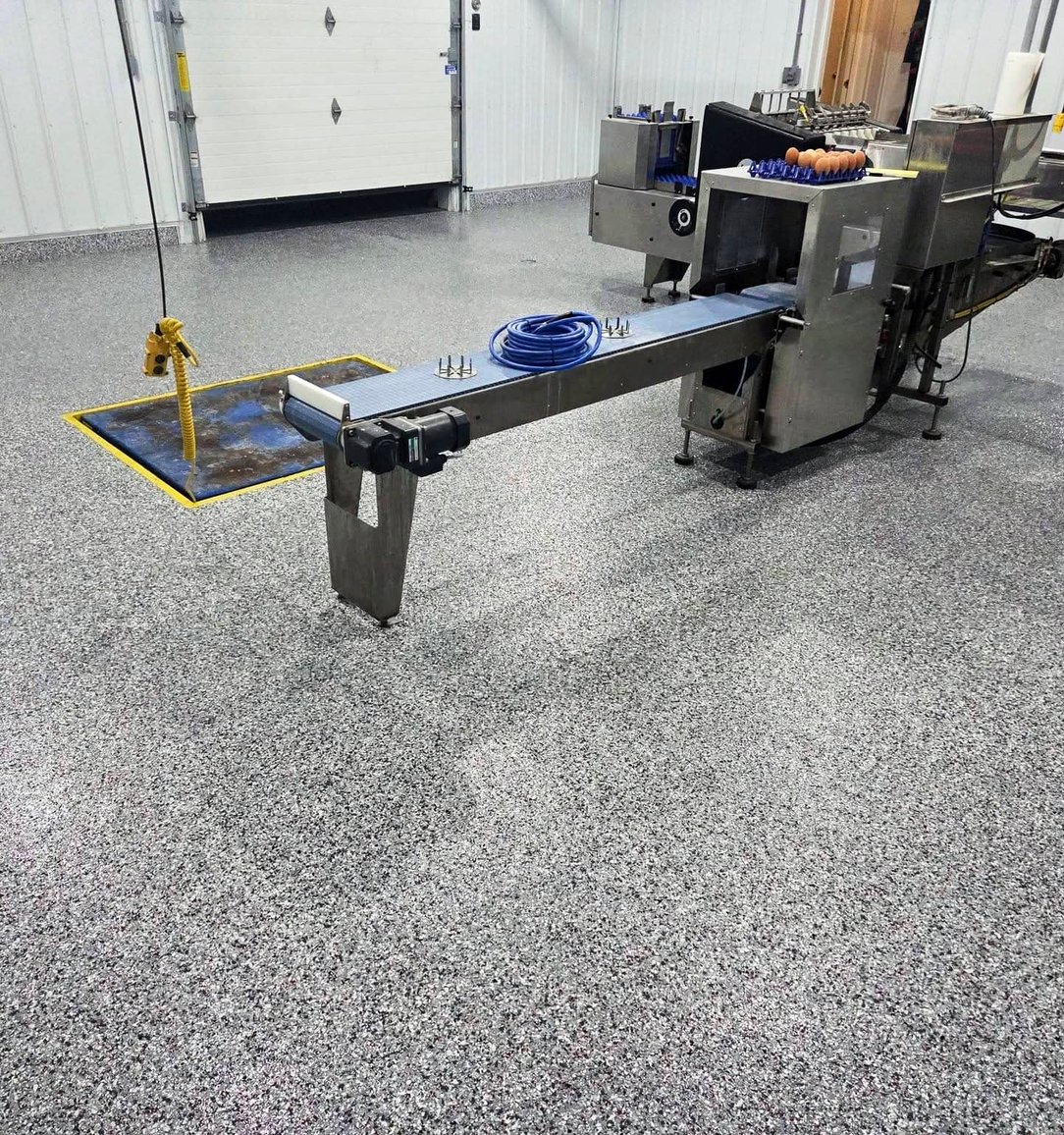 Gray flake epoxy flooring in a food-processing facility
